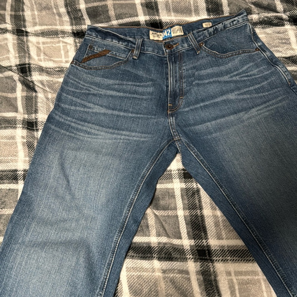 NWT brand new pair of AriatM2 jeans with tags